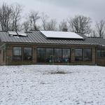 Rear view of home, solar panels on roof