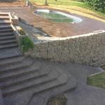 Overview of pool, stamped deck and steps